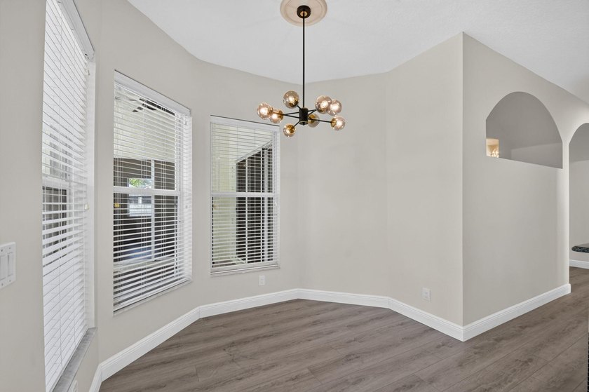 Welcome to this pristine, single-story pool home zoned for - photo 23