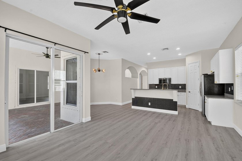 Welcome to this pristine, single-story pool home zoned for - photo 27