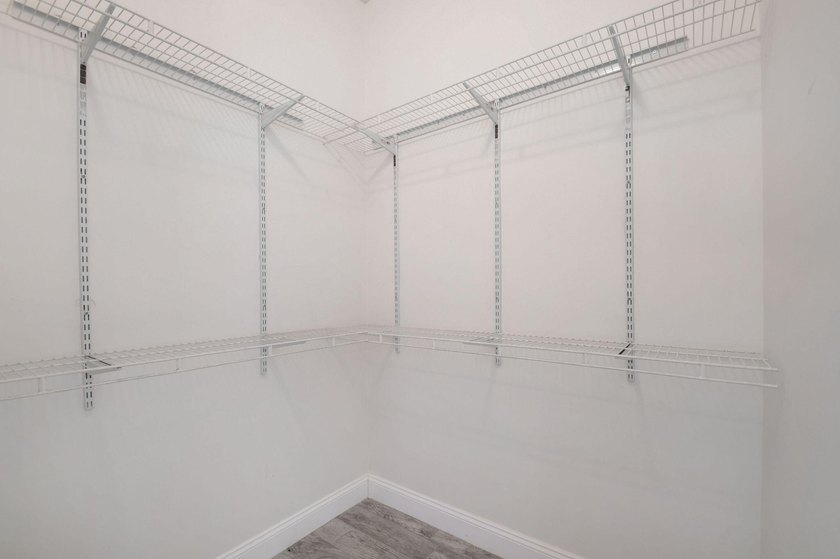 Welcome to this pristine, single-story pool home zoned for - photo 34
