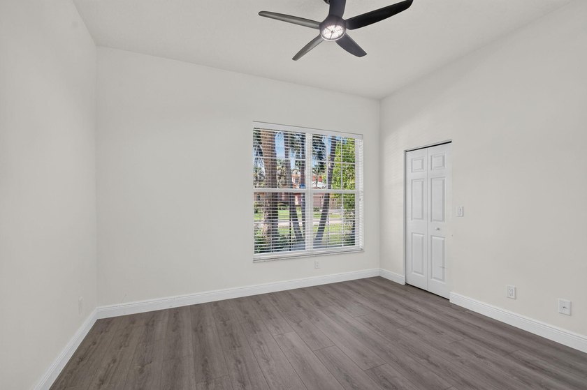 Welcome to this pristine, single-story pool home zoned for - photo 47