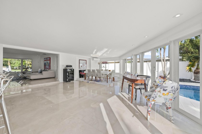 Step into this stunningly reimagined home, where modern elegance - photo 12