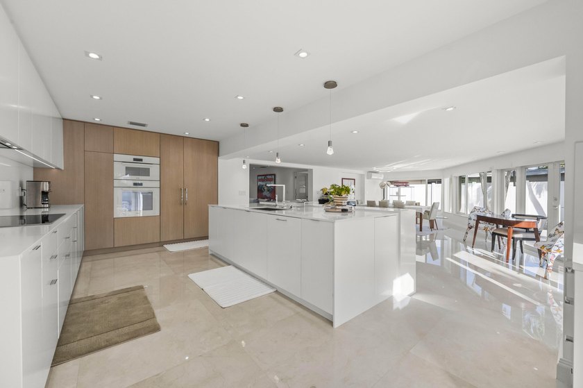 Step into this stunningly reimagined home, where modern elegance - photo 15