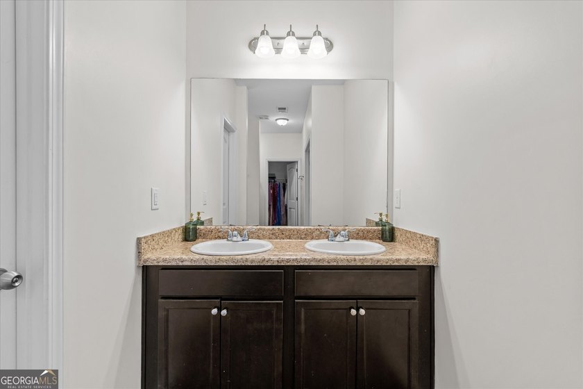 Welcome to this charming 3-bedroom, 2-bath ranch located in an - photo 22