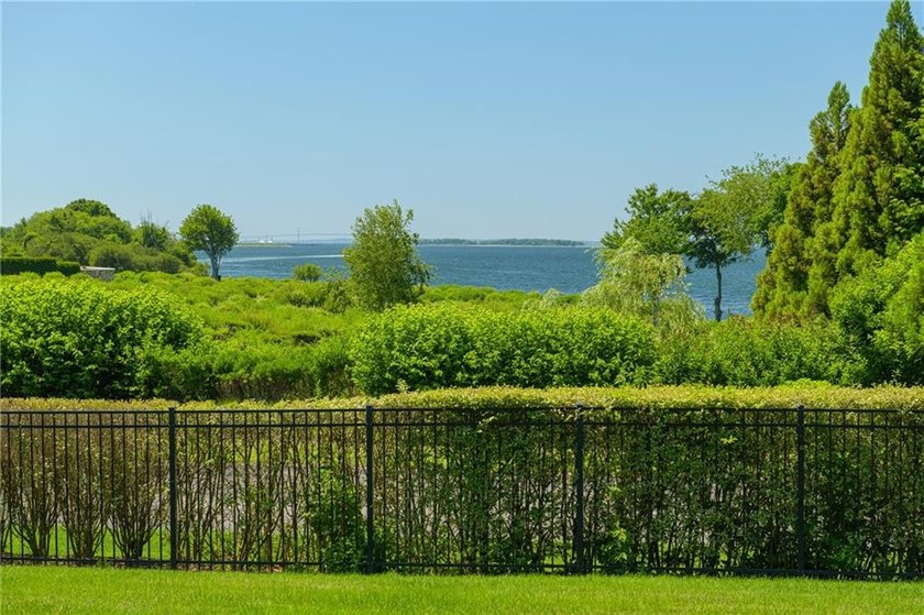 Nestled within the private gates of Carnegie Harbor, one of - photo 31