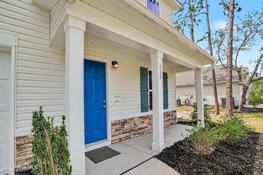 Welcome to 410 Fifty Lakes Drive -- a beautifully designed - photo 3