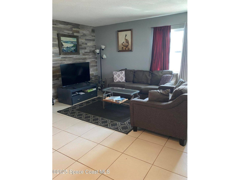 This charming top floor end unit overlooking the sparkling pool - photo 4