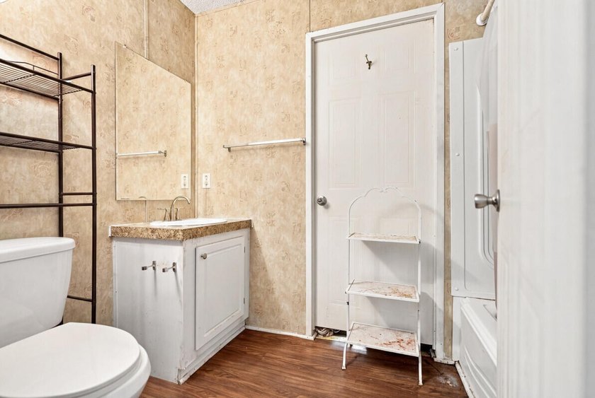 This spacious 3-bedroom, 2-bathroom home offers a bright - photo 14