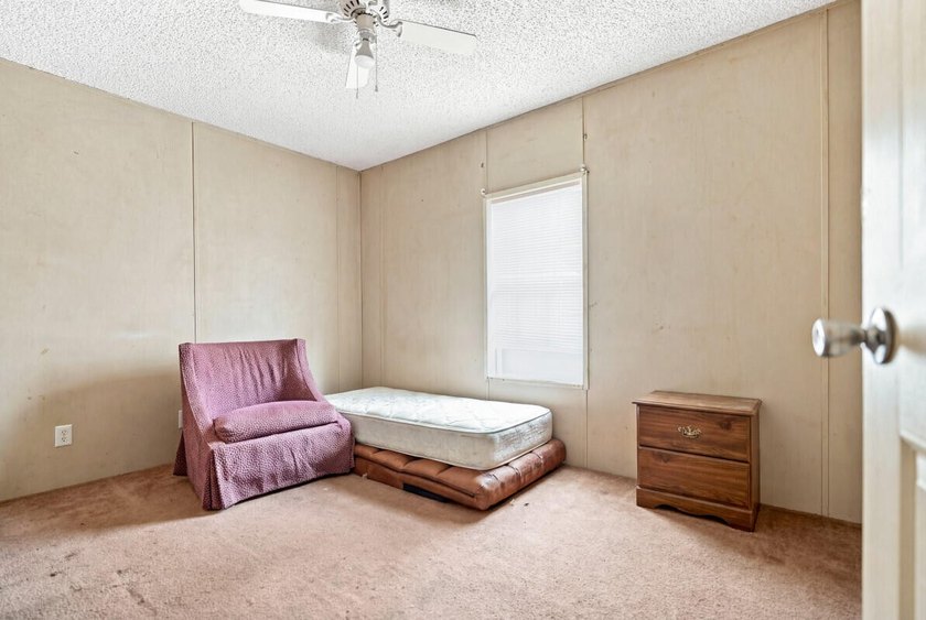 This spacious 3-bedroom, 2-bathroom home offers a bright - photo 15