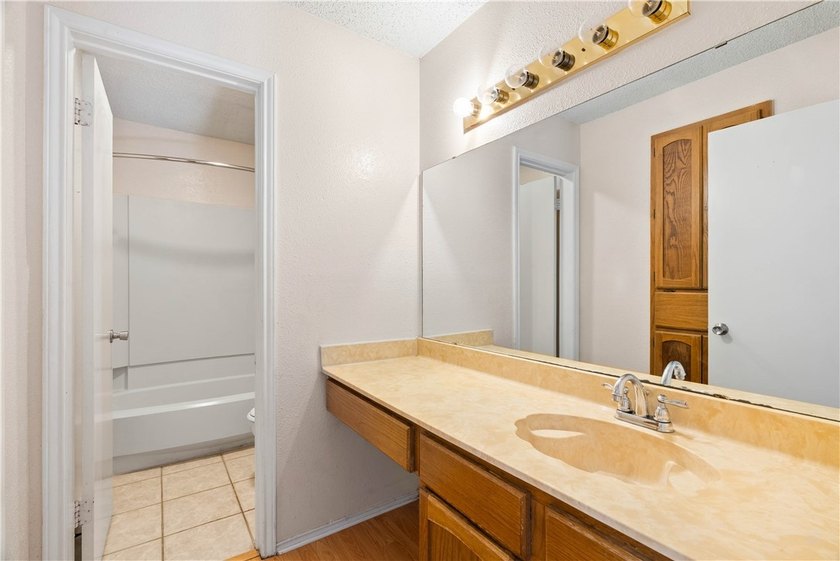 Looking for a condo unit tucked in the back, right across from - photo 8