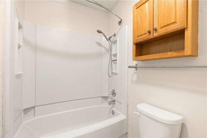 Looking for a condo unit tucked in the back, right across from - photo 9