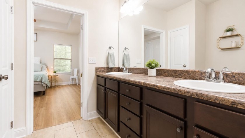 Experience luxurious pond-front living in this beautifully - photo 11