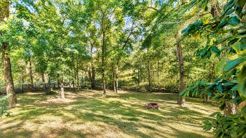 Experience luxurious pond-front living in this beautifully - photo 15
