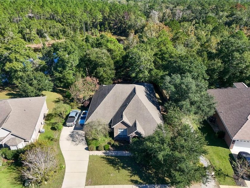 Experience luxurious pond-front living in this beautifully - photo 17