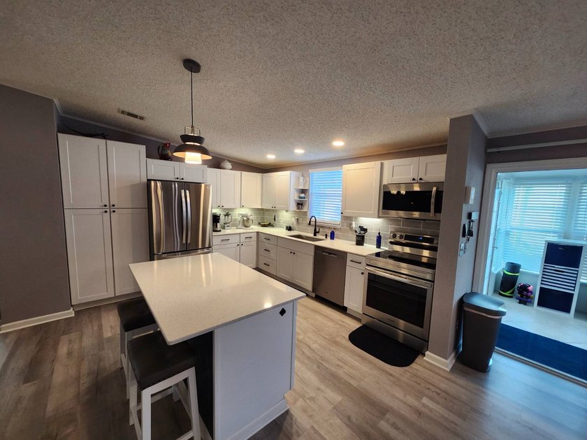PRICE REDUCED/SELLER IS MOTIVATED/HURRY NOW!! WATERFRONT/NOT A - photo 25