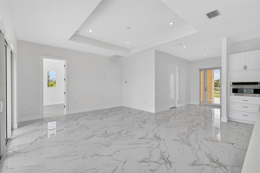 Virtually Staged. Discover luxury coastal living in this - photo 12