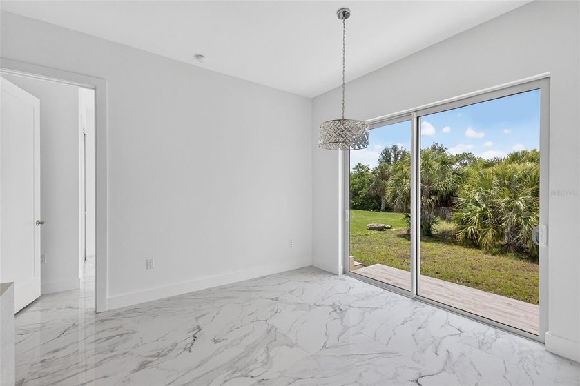 Virtually Staged. Discover luxury coastal living in this - photo 22