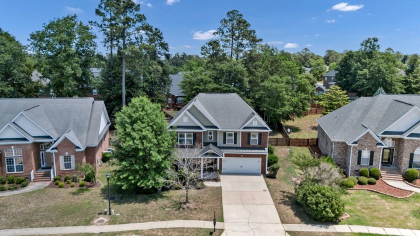 Stunning all brick home with exceptional curb appeal, featuring - photo 4