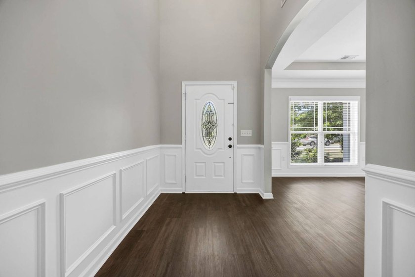 Stunning all brick home with exceptional curb appeal, featuring - photo 6