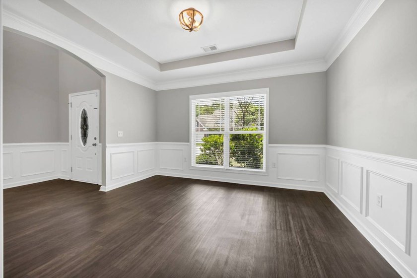 Stunning all brick home with exceptional curb appeal, featuring - photo 7