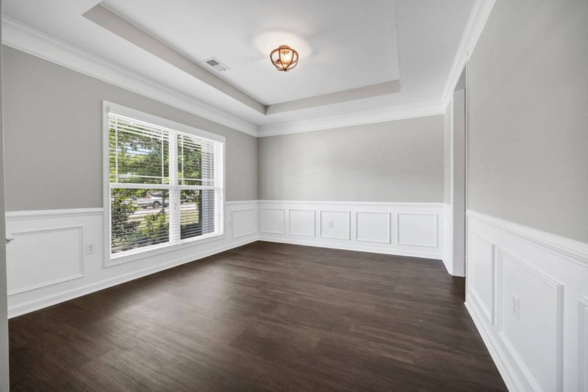 Stunning all brick home with exceptional curb appeal, featuring - photo 9