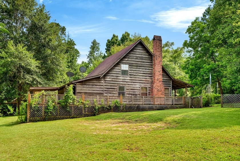 Don't miss this log cabin full of Rustic charm located in - photo 12