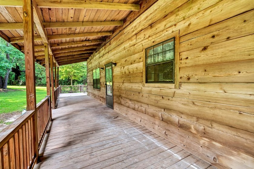 Don't miss this log cabin full of Rustic charm located in - photo 14