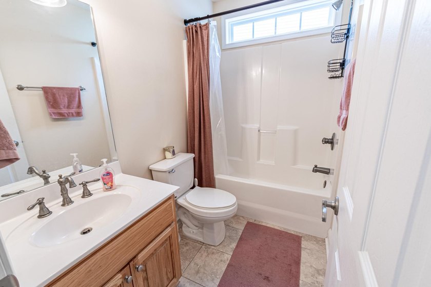 Welcome to Lawson's Landing, where comfort meets coastal - photo 11