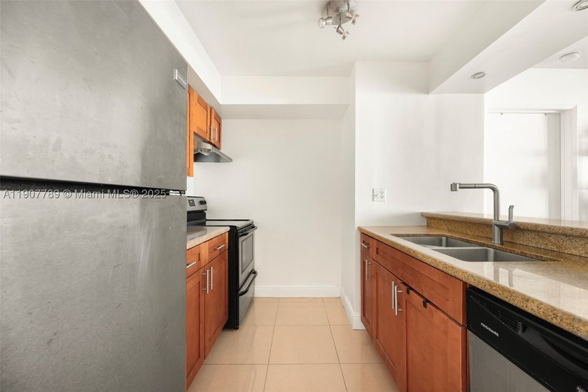Sleek city living meets unmatched convenience in this updated - photo 12