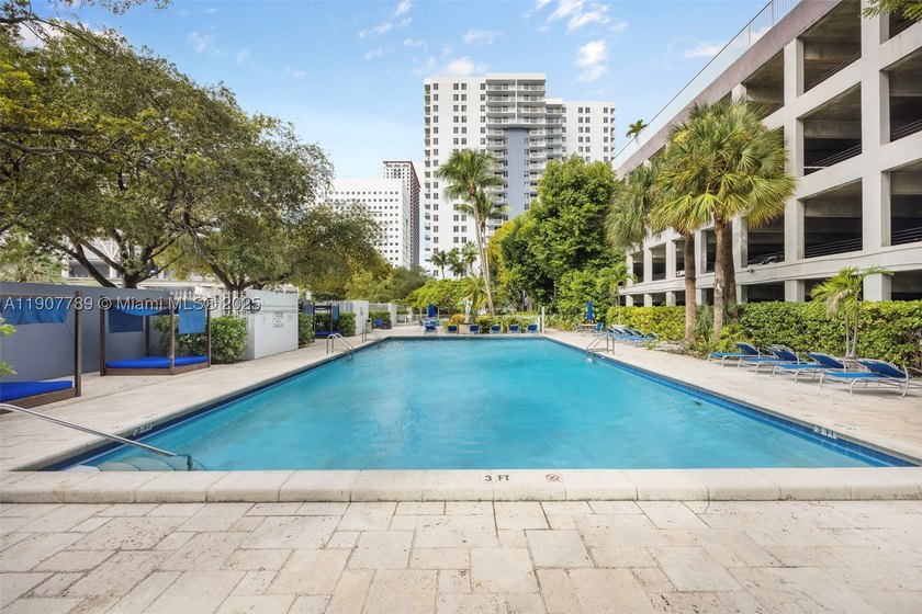 Sleek city living meets unmatched convenience in this updated - photo 21