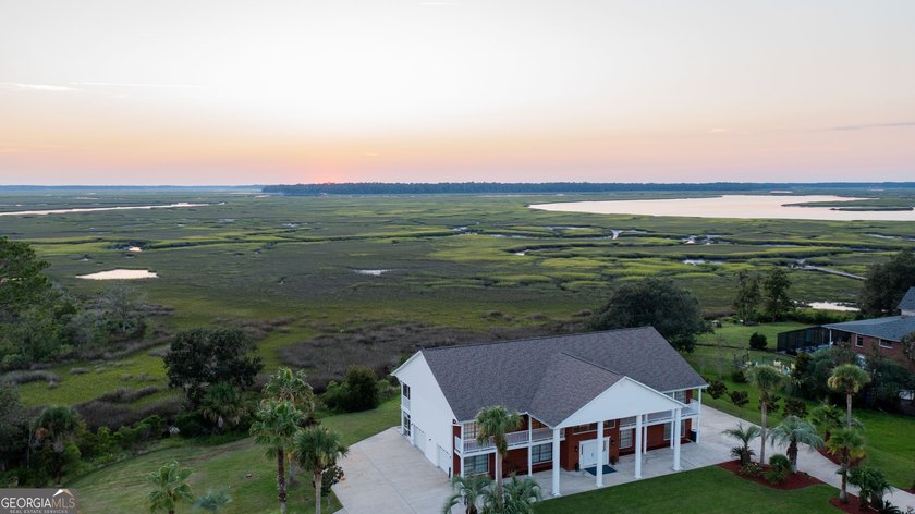 Enjoy the sunset every night! This beautiful 2-story brick home - photo 19