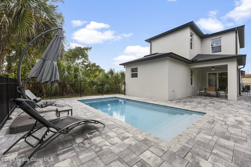 Experience modern luxury and effortless downtown living in this - photo 3