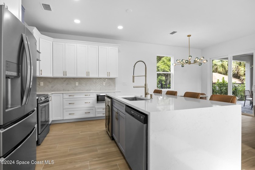 Experience modern luxury and effortless downtown living in this - photo 10