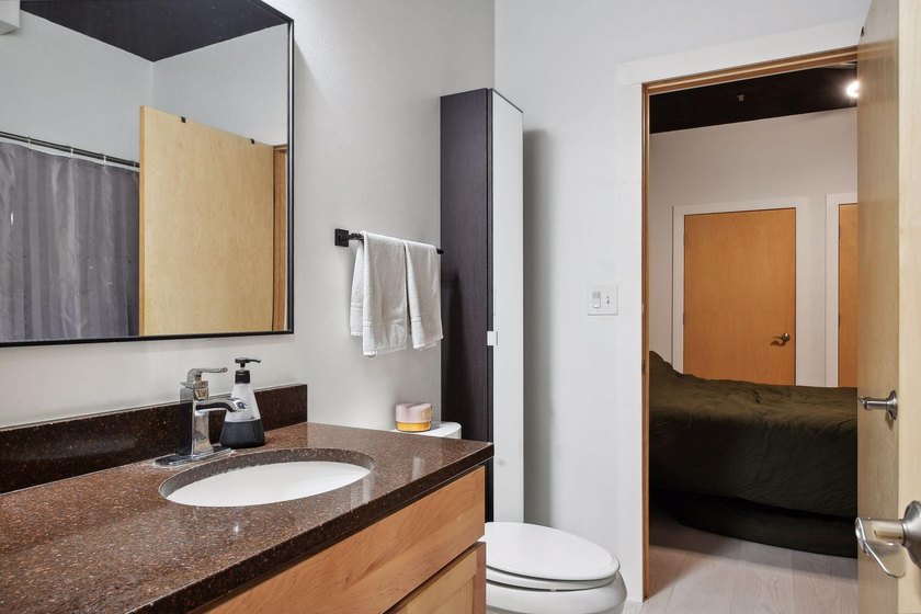 Embrace effortless urban living in this beautifully appointed - photo 18