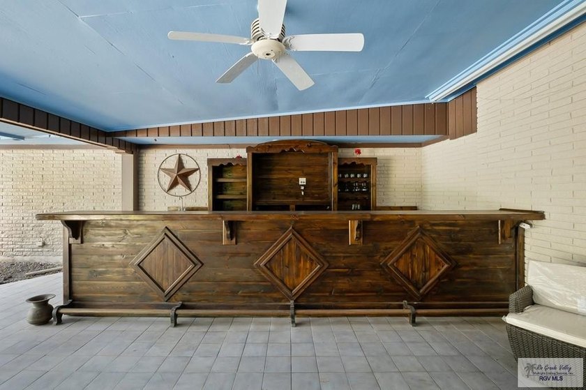 Nestled in the heart of San Benito, this stunning resaca-front - photo 32