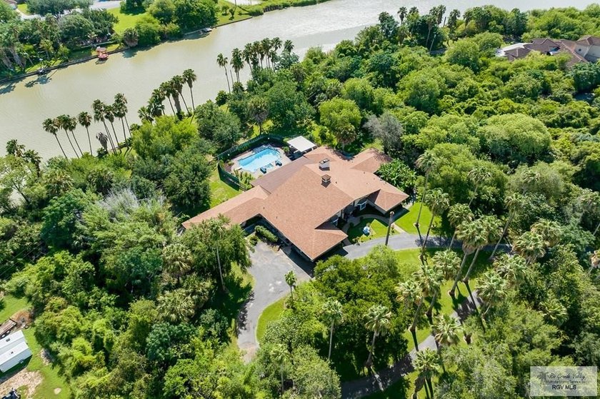 Nestled in the heart of San Benito, this stunning resaca-front - photo 43