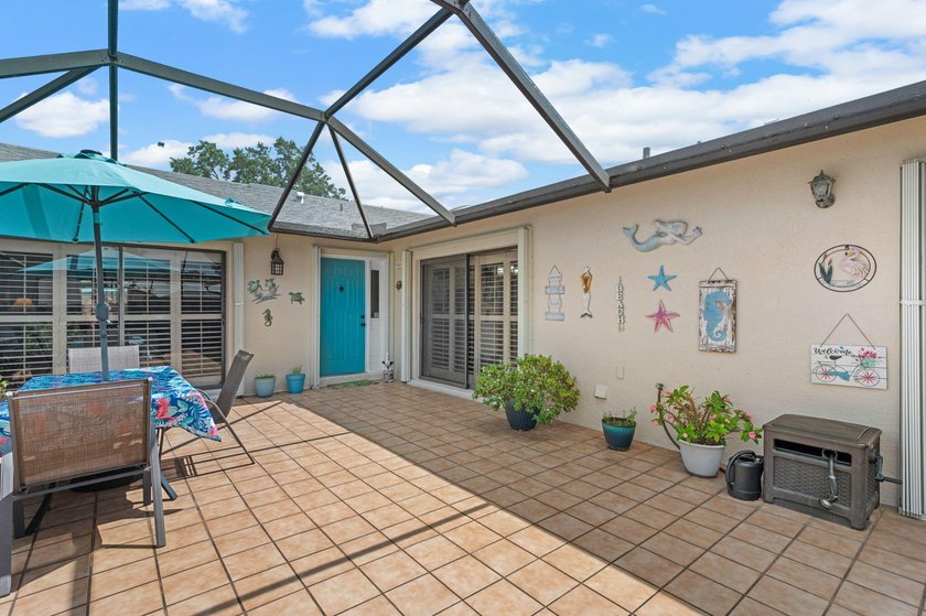 Move-in ready 2BR/2BA villa featuring a rare oversized 1.5-car - photo 21