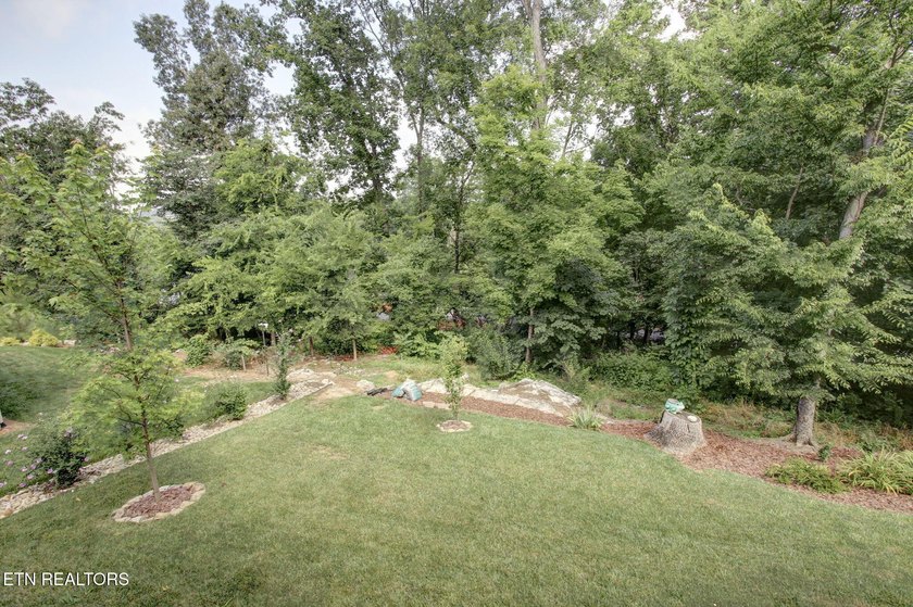 Welcome to this beautifully crafted one-level home in the highly - photo 31