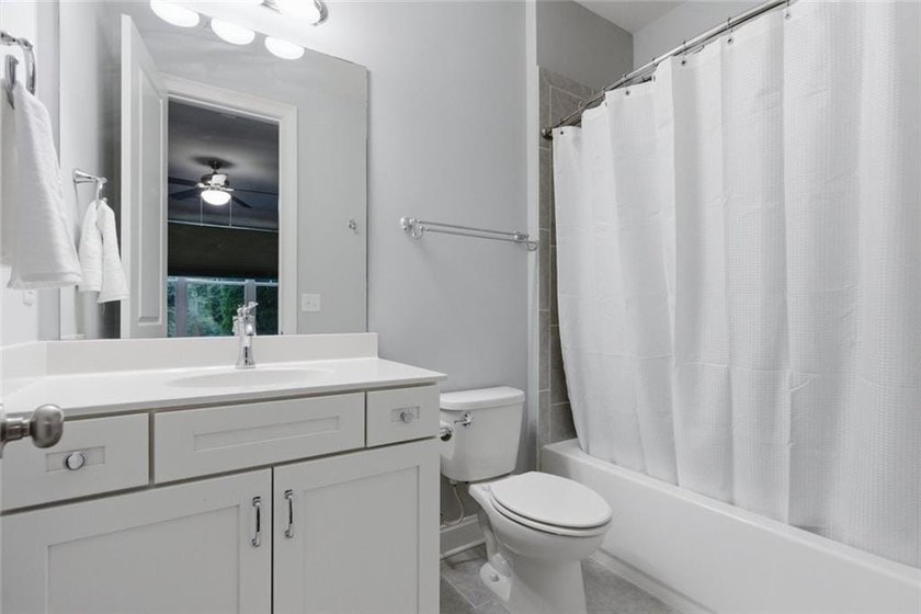 Perfectly positioned in the gated Harlow community, this - photo 10