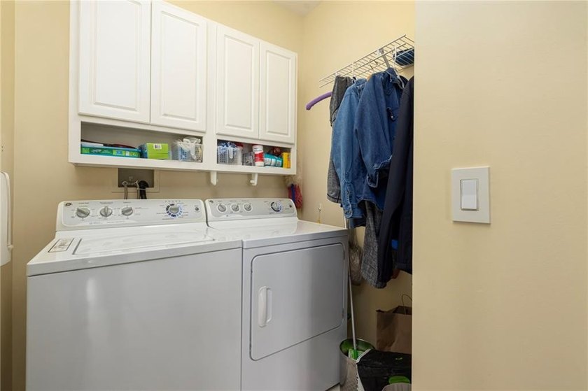 We invite you to explore this expansive end-unit - photo 25