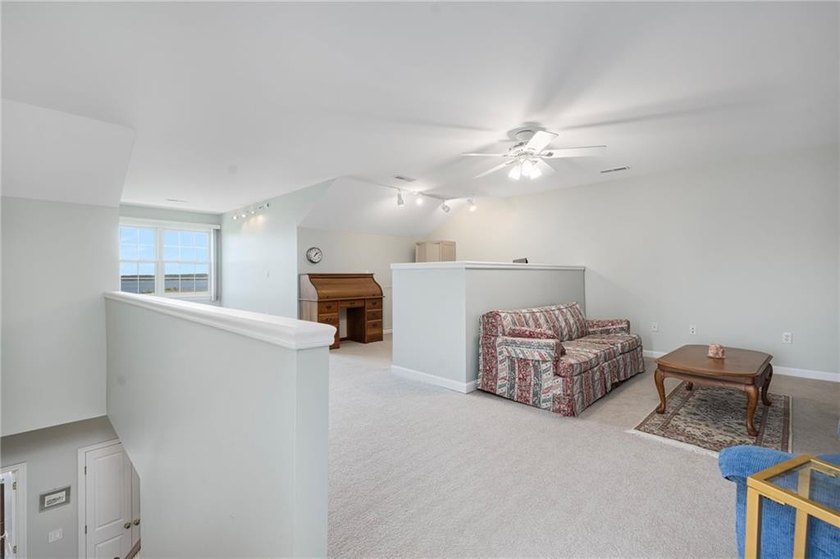 We invite you to explore this expansive end-unit - photo 27