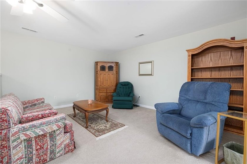 We invite you to explore this expansive end-unit - photo 28