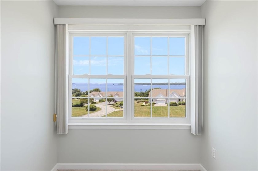 We invite you to explore this expansive end-unit - photo 33