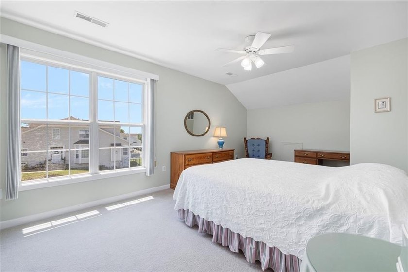 We invite you to explore this expansive end-unit - photo 36