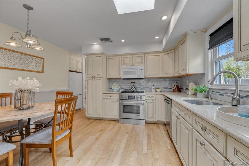 Move Right Into This Updated 4 Bedroom, 3 Bath Expanded Ranch in - photo 9