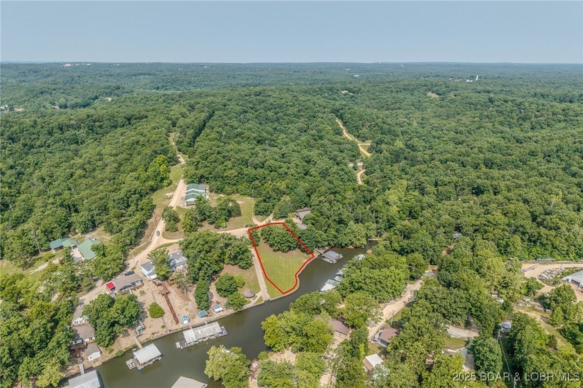 ABSOLUTELY GEORGOUS lake front building lot that is just over - photo 3