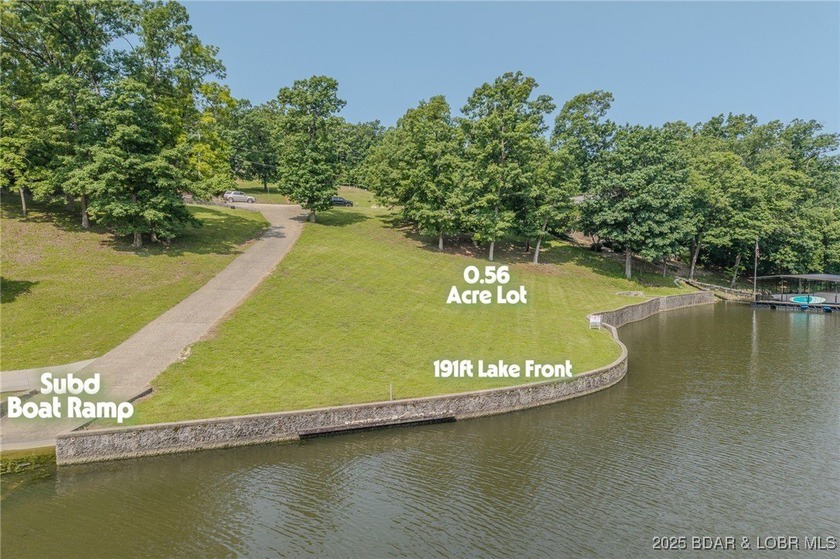 ABSOLUTELY GEORGOUS lake front building lot that is just over - photo 4