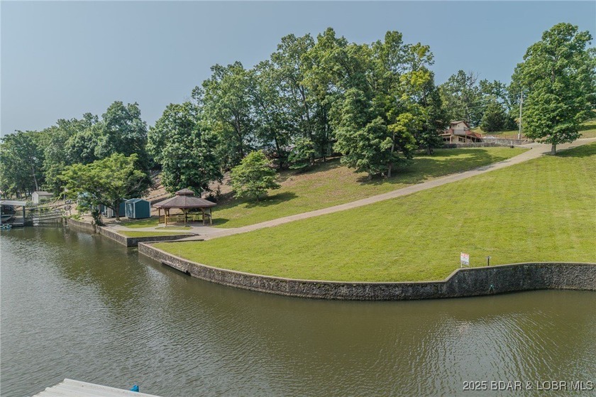 ABSOLUTELY GEORGOUS lake front building lot that is just over - photo 9