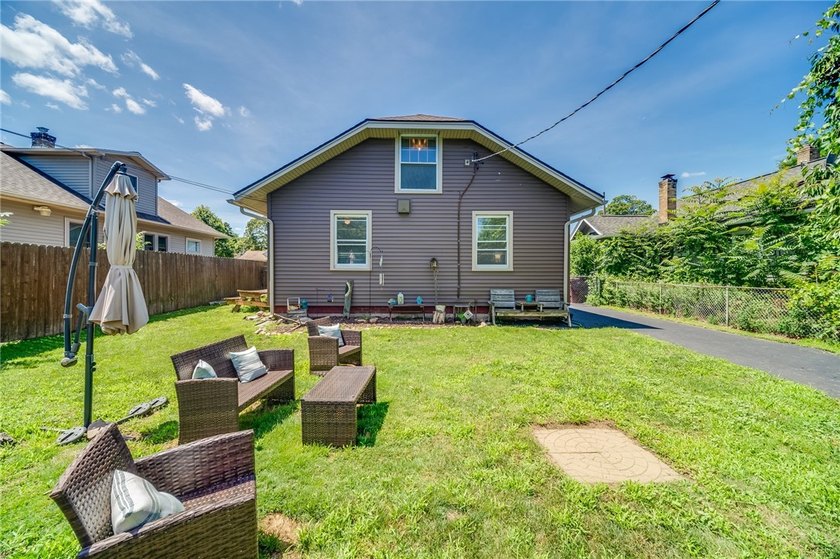 Welcome home to this charming 4-bedroom bungalow, where comfort - photo 14