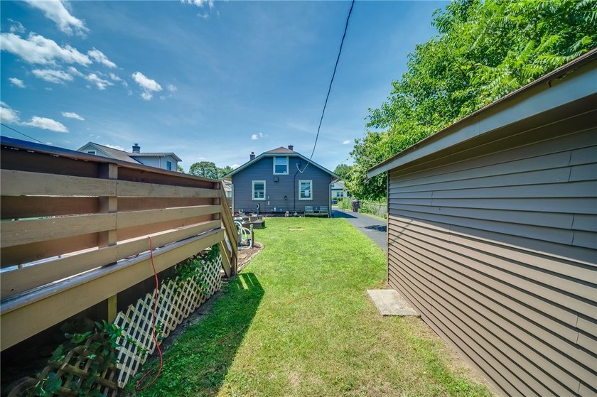 Welcome home to this charming 4-bedroom bungalow, where comfort - photo 18