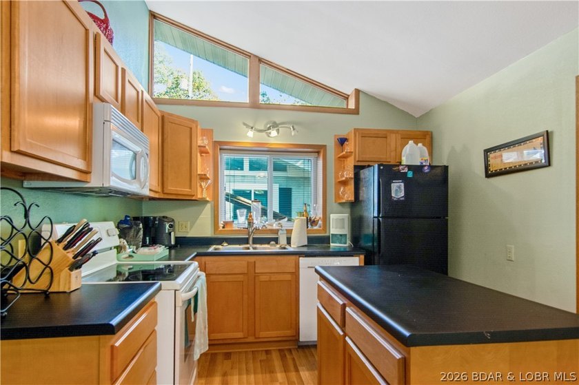 Looking for a 2-bedroom home in Lake Ozark sitting directly on - photo 22